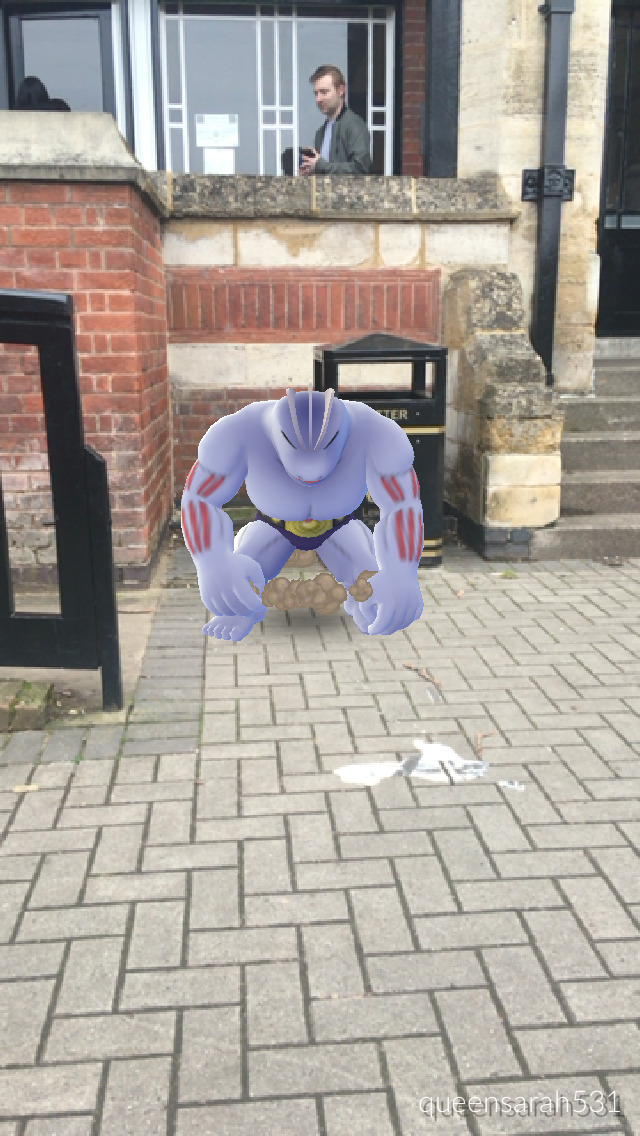 This picture looks like Machoke is sad about losing his ice cream and I love it